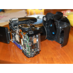 Шаг 3 Как чистить липкие кнопки Canon PowerShot SX Series 