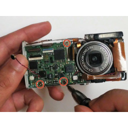 Шаг 7 Замена материнской платы Canon PowerShot SD30 